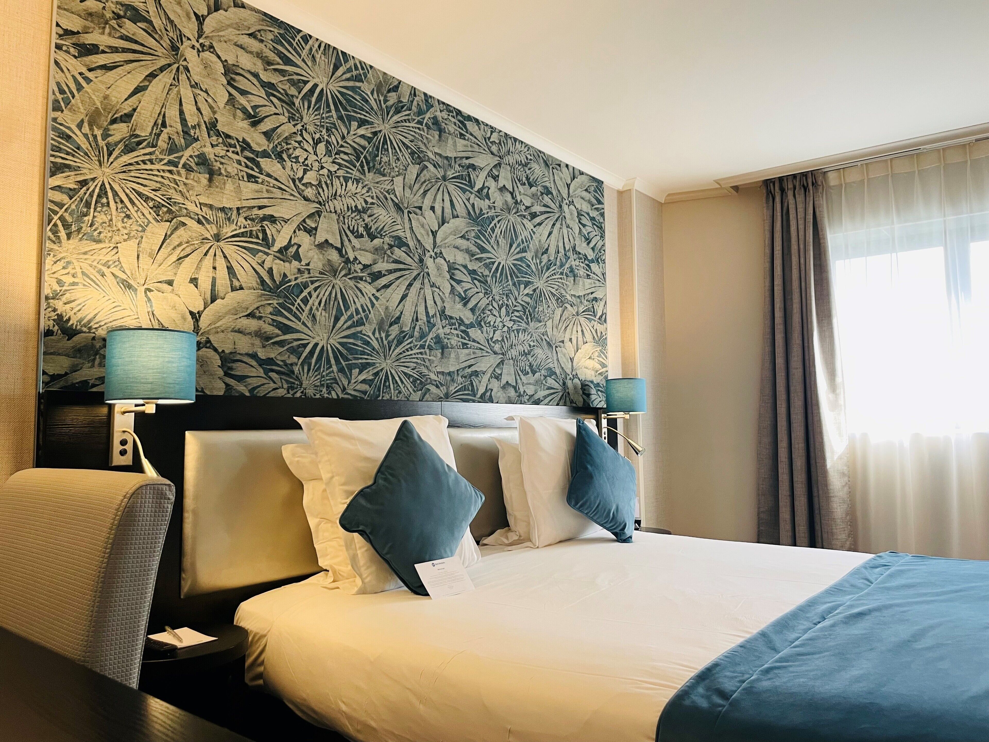 superior room, 1 king bed | in-room safe, individually decorated, desk, soundproofing
