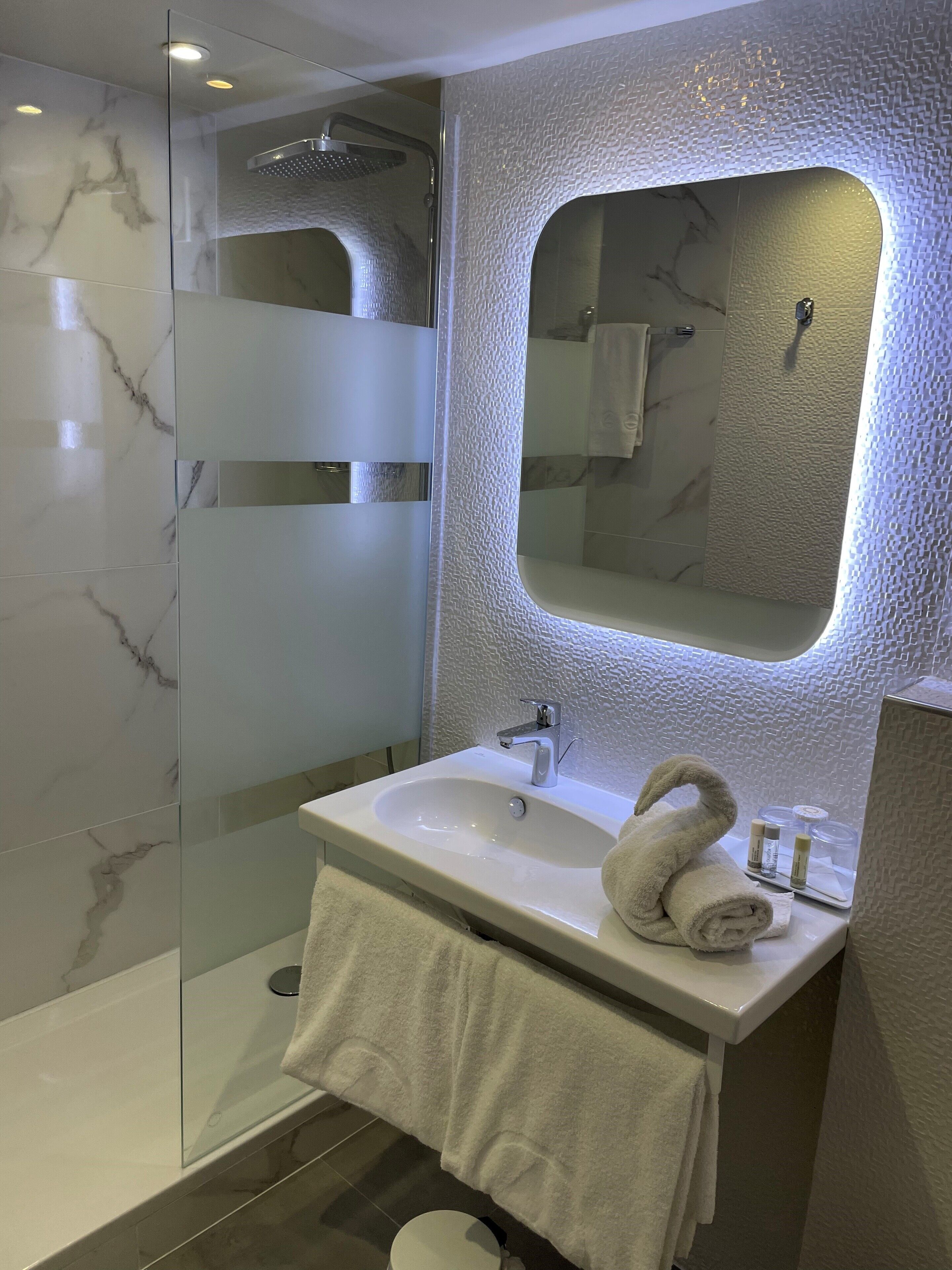 superior room, 1 king bed | bathroom | rainfall showerhead, hair dryer, towels