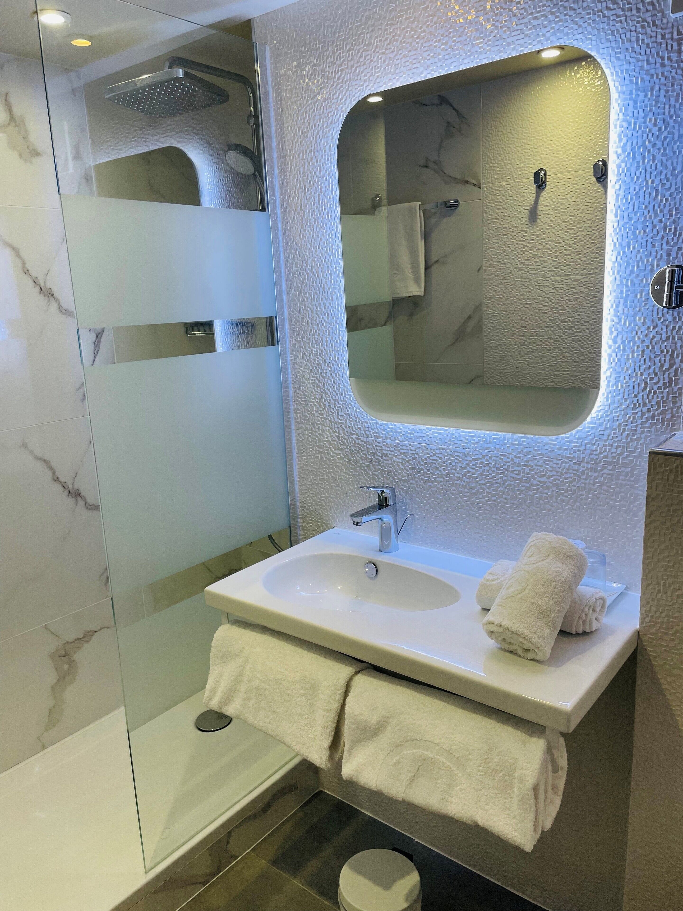 superior room, 1 king bed | bathroom | rainfall showerhead, hair dryer, towels