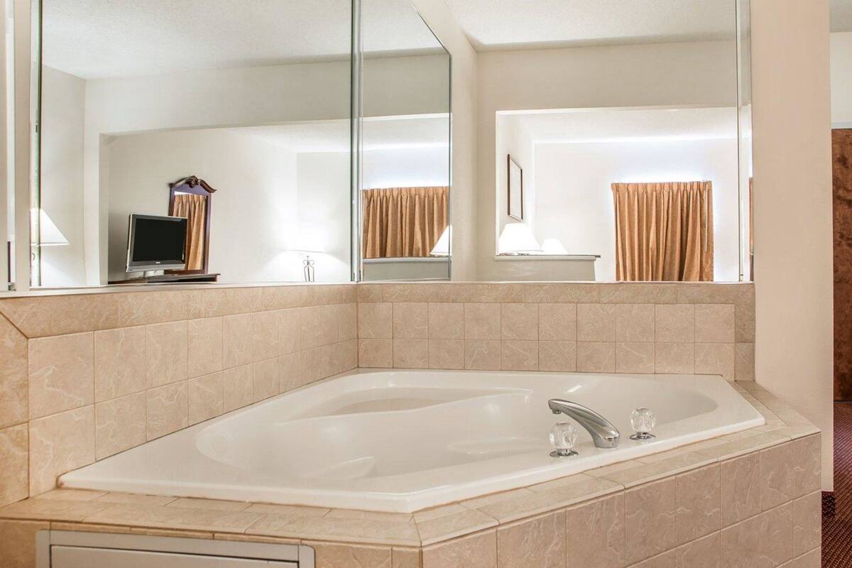 suite, 1 king bed with sofa bed, non smoking | in-room safe, desk, iron/ironing board, free wifi