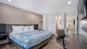 Deluxe Suite, 1 King Bed, Smoking, Kitchenette | Desk, free WiFi, bed sheets