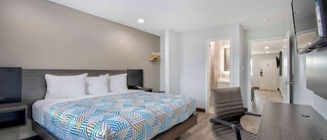 Deluxe Suite, 1 King Bed, Smoking, Kitchenette | Desk, free WiFi, bed sheets