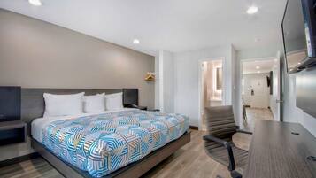 Deluxe Suite, 1 King Bed, Smoking, Kitchenette | Desk, free WiFi, bed sheets