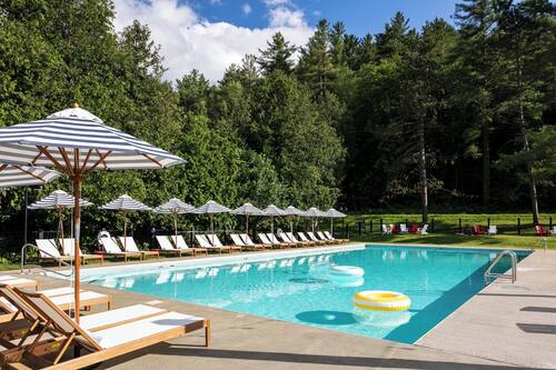 Outdoor pool, pool umbrellas, sun loungers