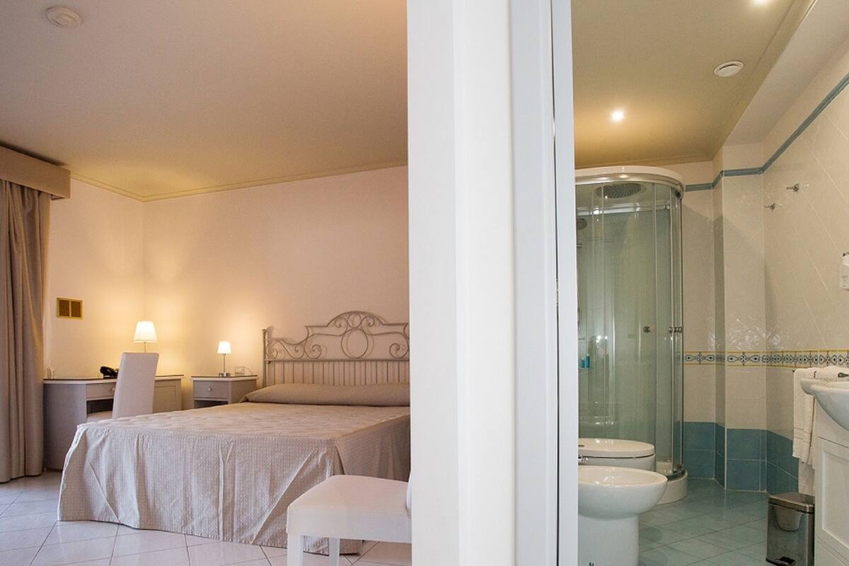 standard triple room | minibar, in-room safe, desk, blackout curtains