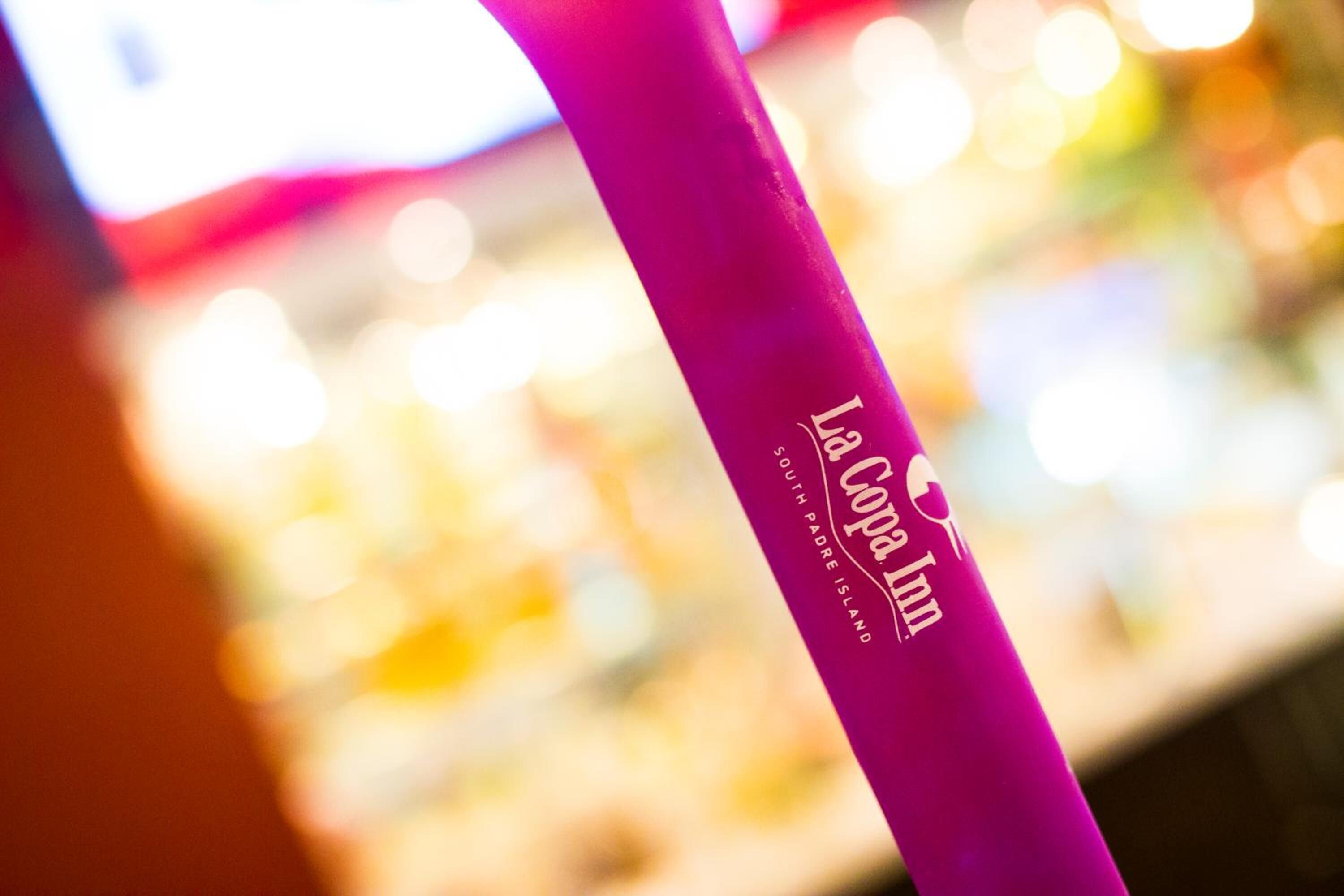 A pink object with the text "La Copa Inn" and "South Padre Island" on it.