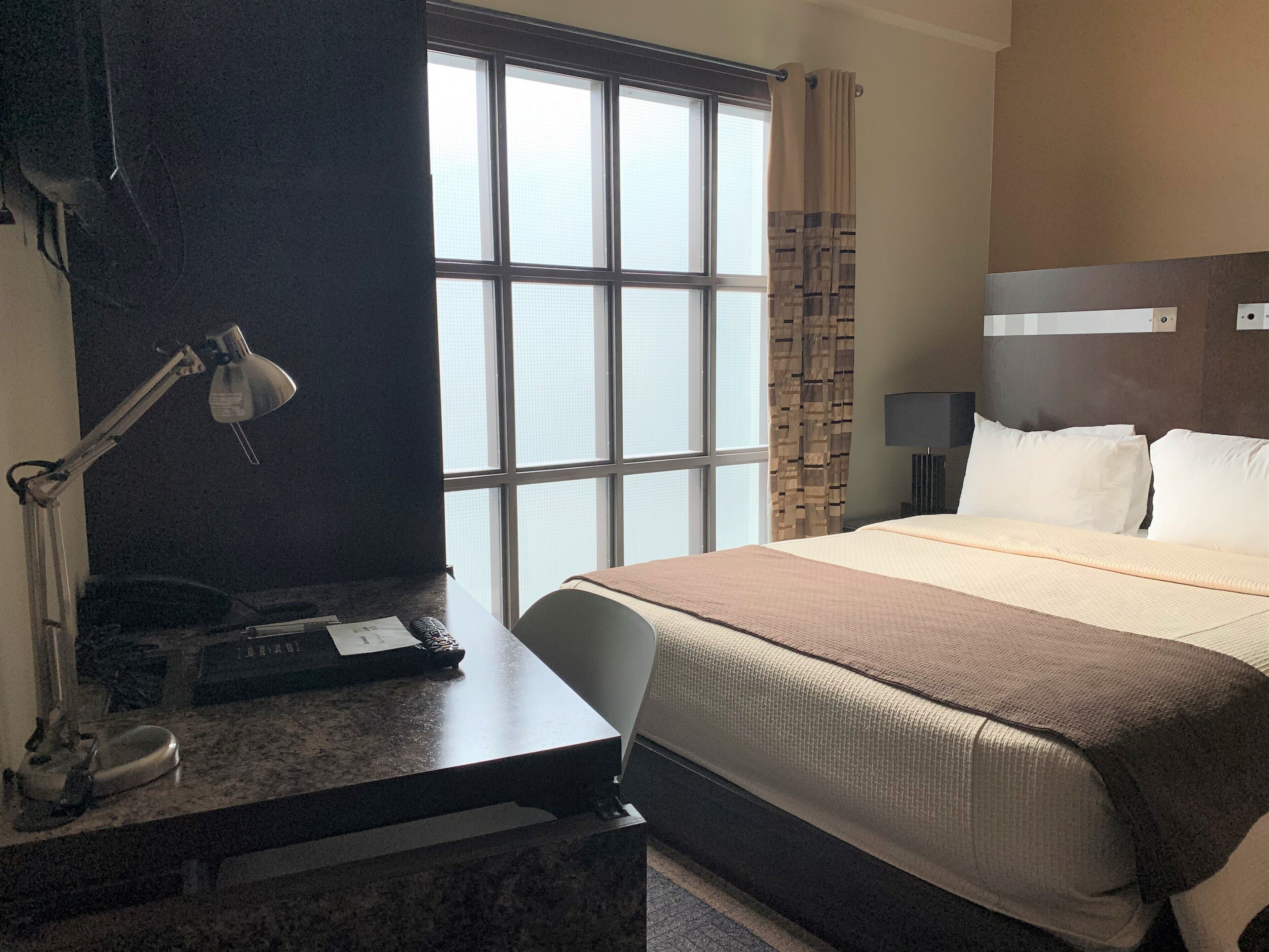 classic room, 1 queen bed, courtyard area | 1 bedroom, hypo-allergenic bedding, desk, laptop workspace