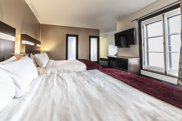 Junior Room, 2 Queen Beds | Hypo-allergenic bedding, desk, laptop workspace, blackout drapes