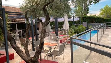 Outdoor pool, open 9:00 AM to 7:30 PM, sun loungers