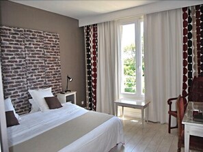 Premium bedding, in-room safe, individually decorated, desk