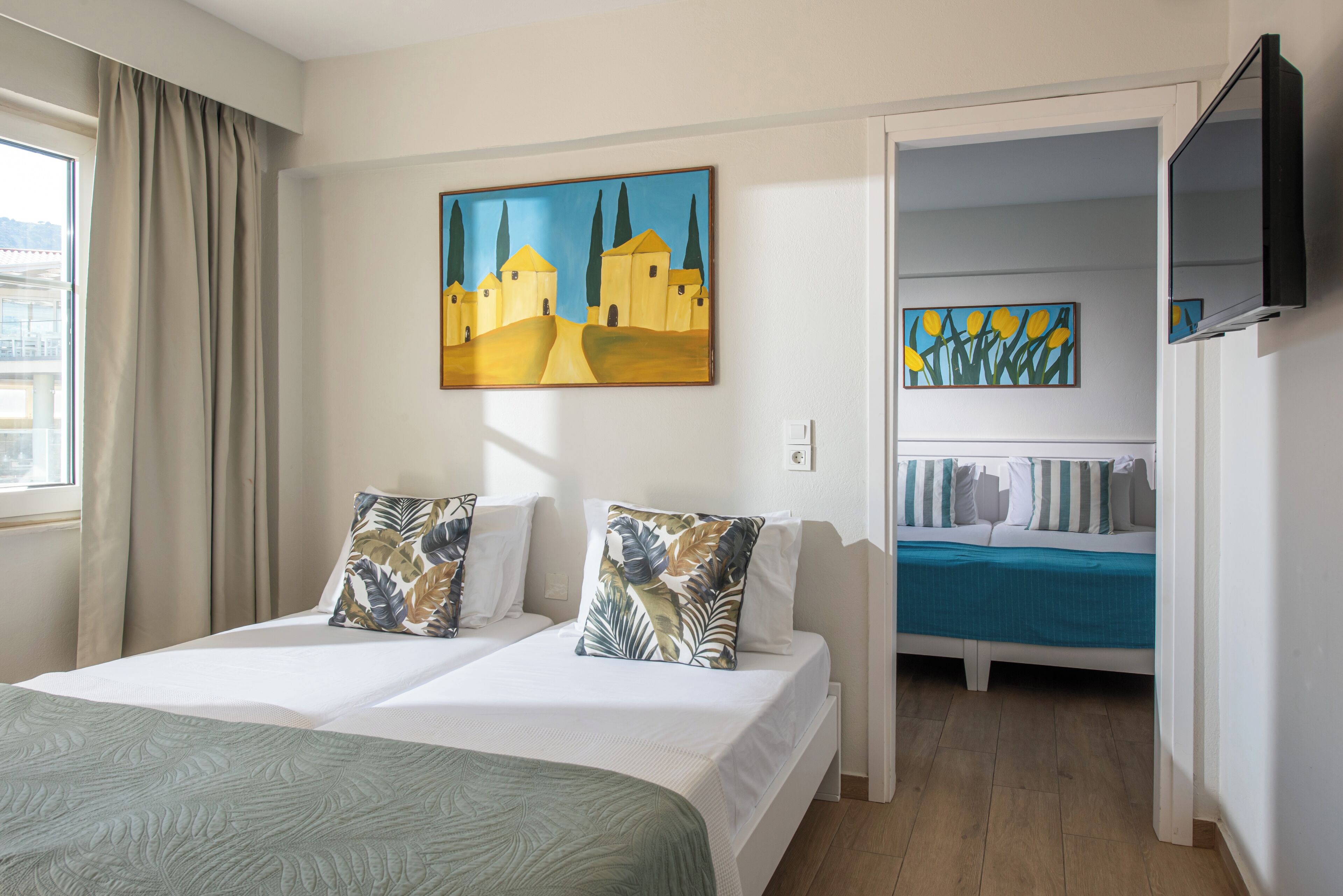 Family Room, 2 Bedrooms, Garden View | Laptop workspace, soundproofing, bed sheets