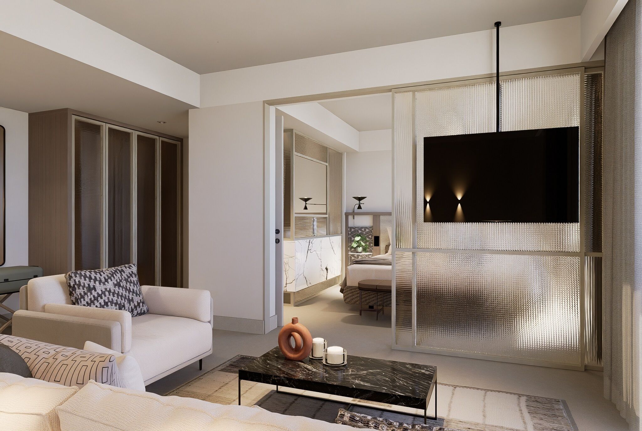 A modern living room with a sofa, coffee table, and a TV.