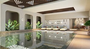 Indoor pool, seasonal outdoor pool, pool umbrellas, sun loungers