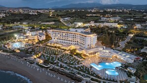 A resort with multiple swimming pools, a beach, and a large hotel building. - Creta Star Hotel (Rethymno)