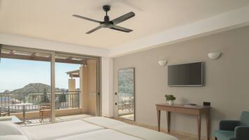 Junior Suite, Sea View | In-room safe, desk, blackout drapes, bed sheets