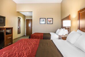A hotel room with two beds, a TV, a microwave, and a desk with a lamp. - Comfort Inn Frederick - Ballenger Creek (Frederick)