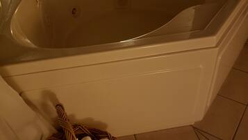 Luxury Suite, 1 King Bed, Jetted Tub | Private spa tub