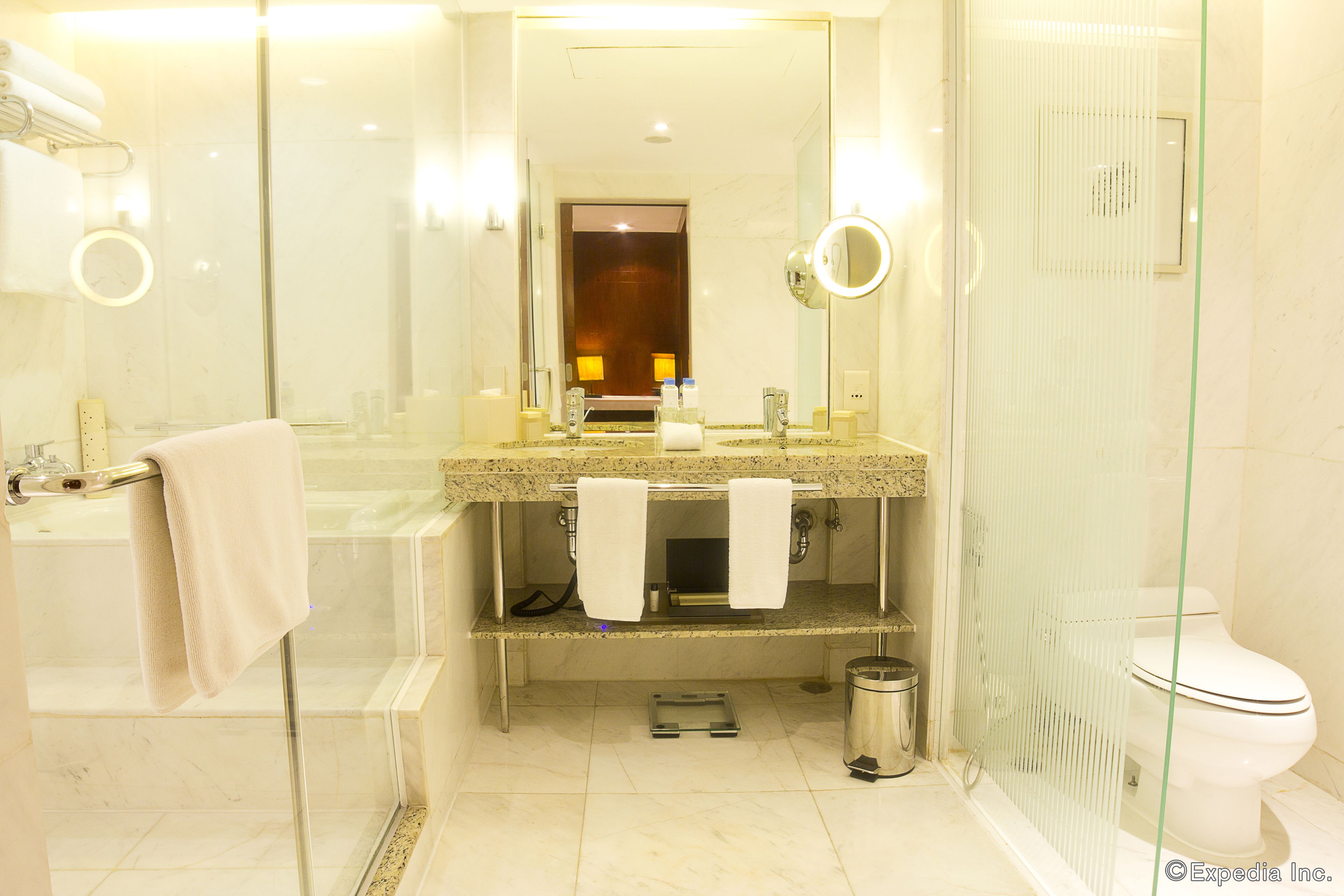 separate bathtub and shower, deep-soaking bathtub, designer toiletries