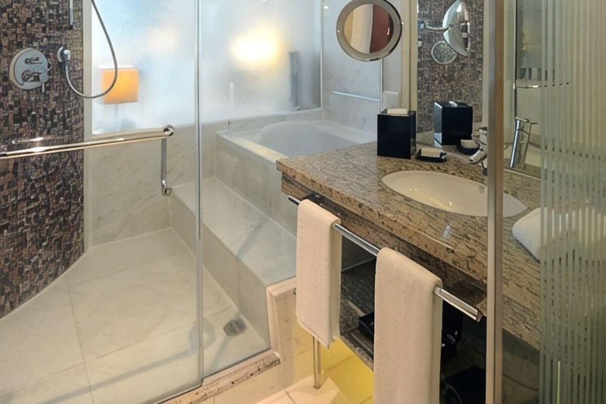 Bathroom | Separate bathtub and shower, deep-soaking bathtub, designer toiletries