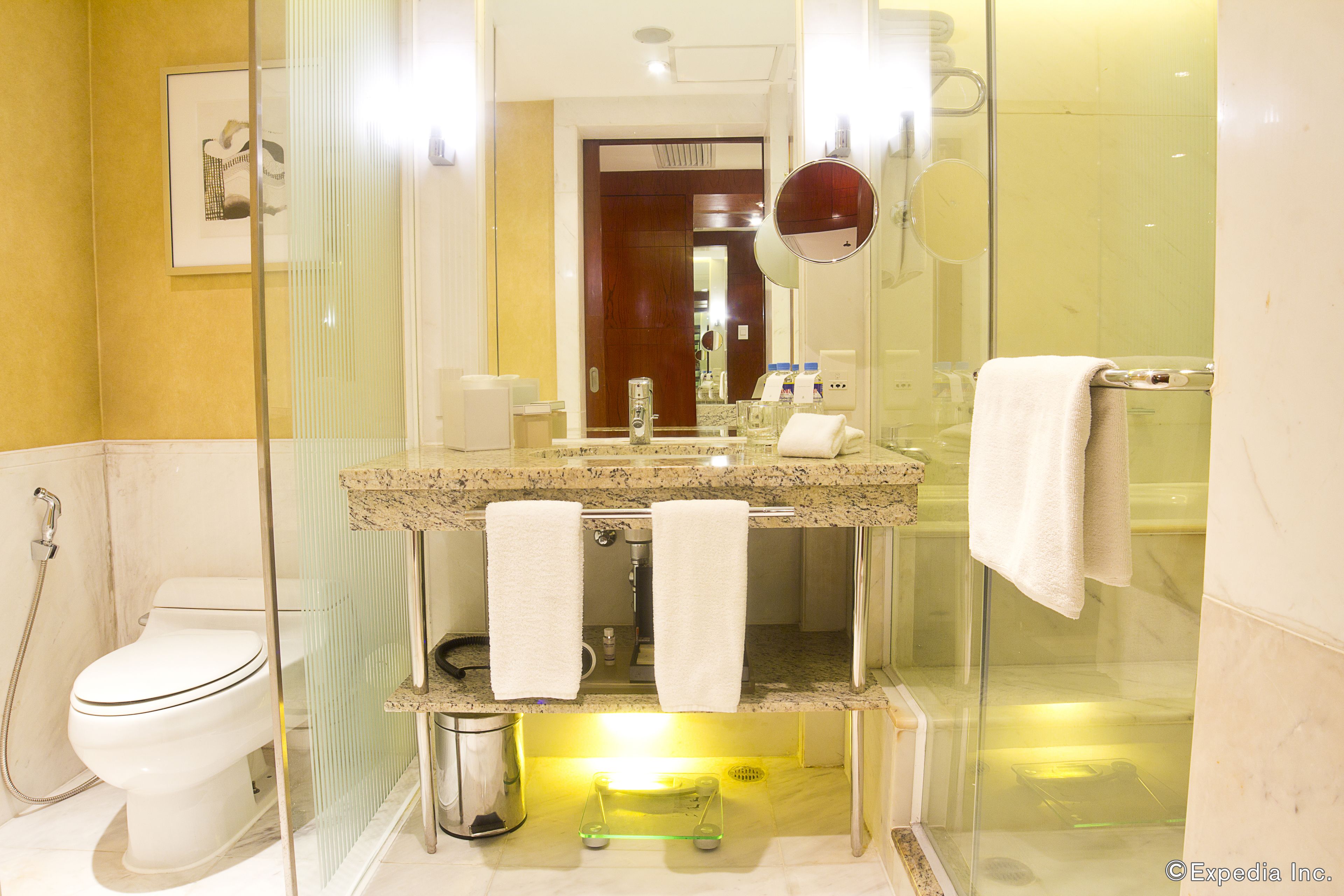 separate bathtub and shower, deep-soaking bathtub, designer toiletries