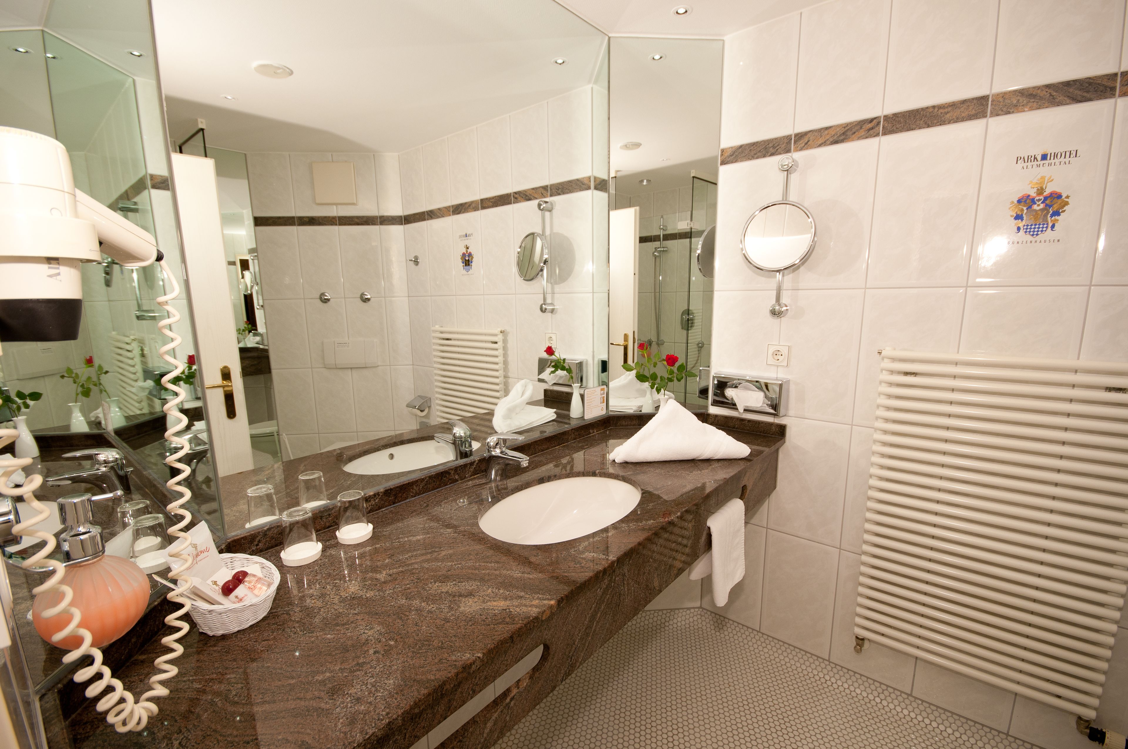 hair dryer, bathrobes, towels