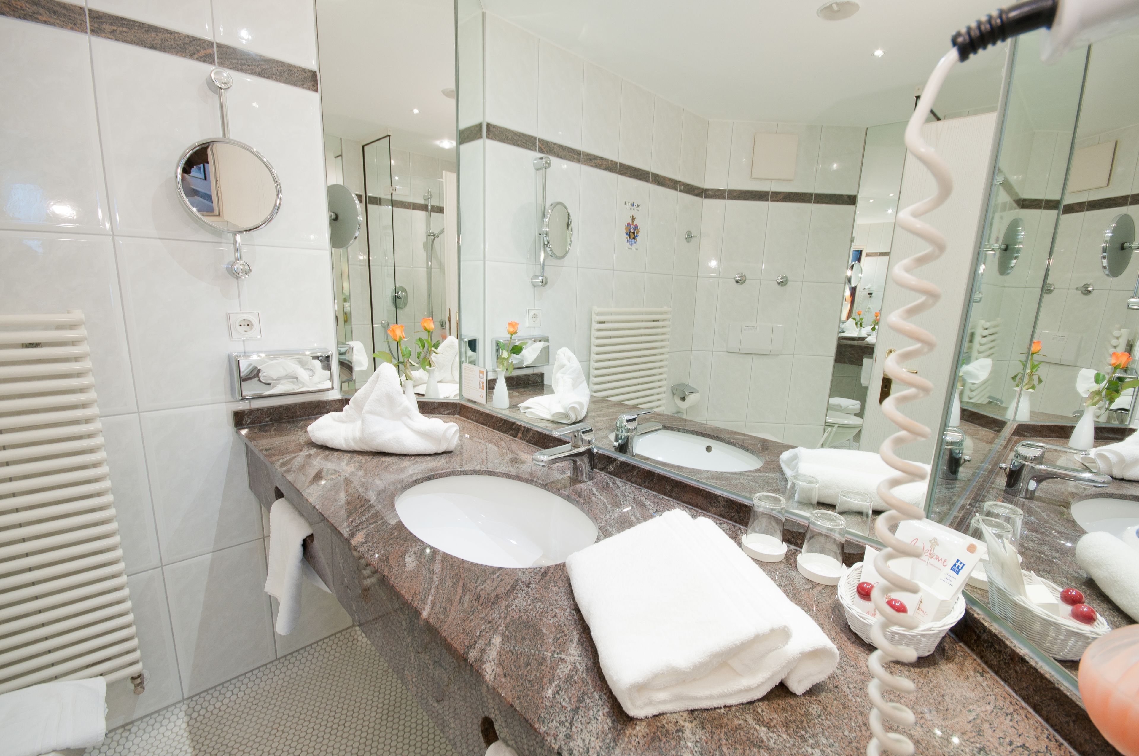 junior studio suite | bathroom | hair dryer, bathrobes, towels
