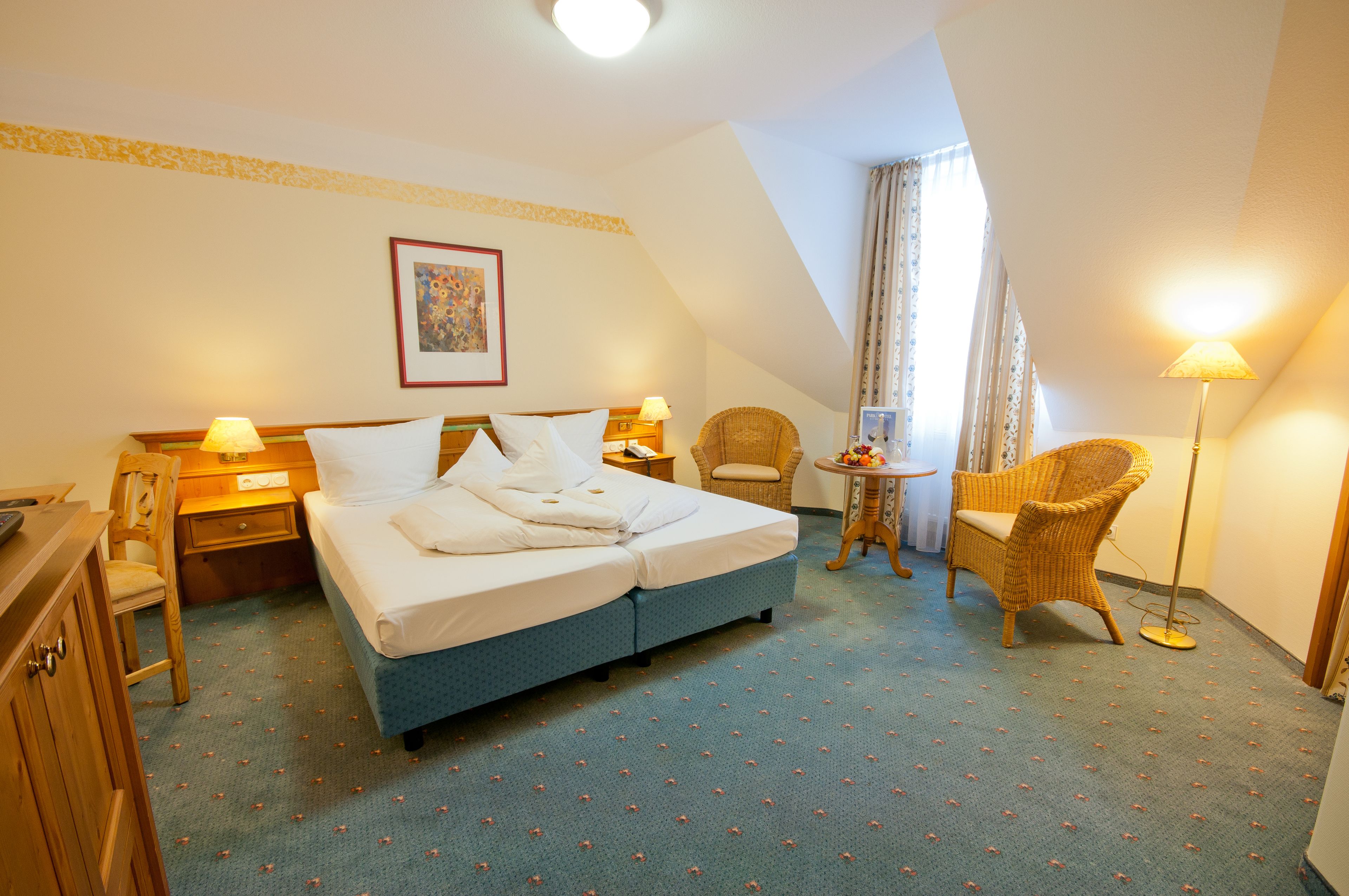 hypo-allergenic bedding, down duvets, minibar, desk