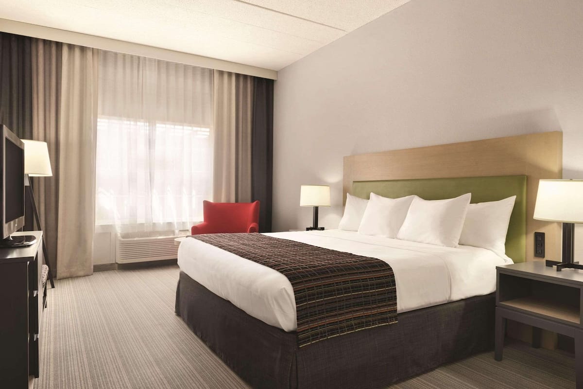 premium bedding, desk, blackout curtains, soundproofing