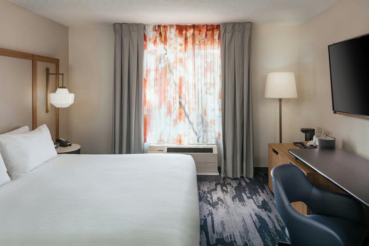 Premium bedding, desk, blackout drapes, iron/ironing board