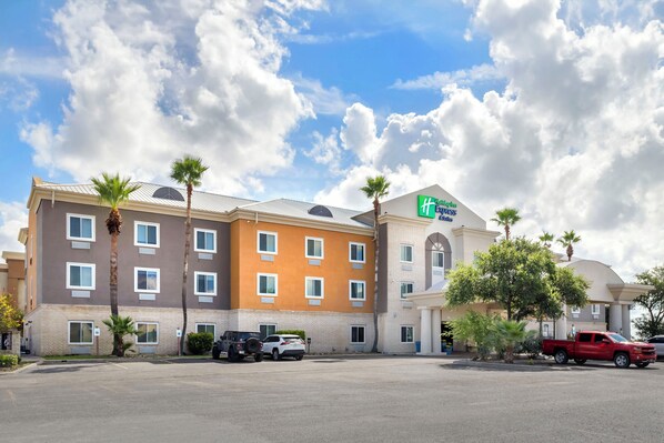Experience the tropical ambiance of this hotel, surrounded by palm trees and modern architecture.