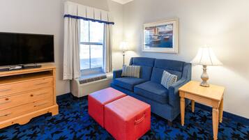 Hypo-allergenic bedding, desk, laptop workspace, blackout curtains