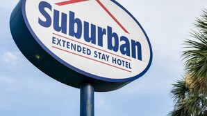 A sign for Suburban Extended Stay Hotel. - Suburban Studios Avondale (Westwego)