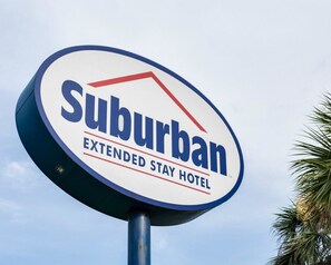 A sign for Suburban Extended Stay Hotel. - Suburban Studios Avondale (Westwego)