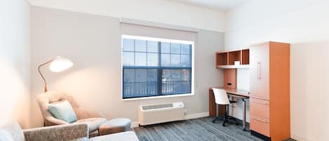 Suite, 1 Bedroom | Hypo-allergenic bedding, desk, laptop workspace, iron/ironing board