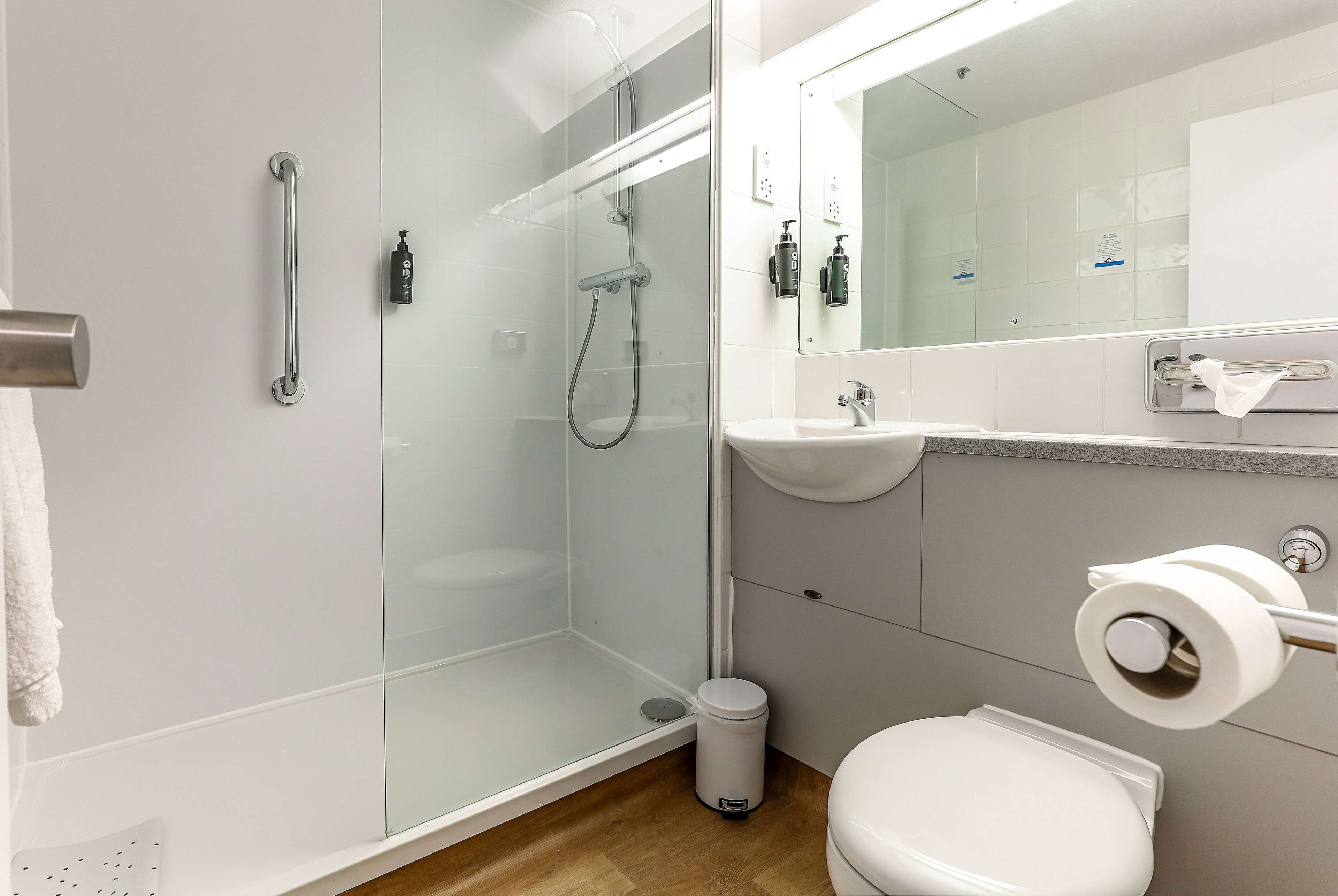 Eco-friendly toiletries, hair dryer, towels