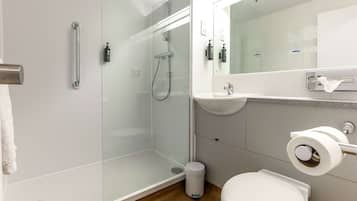 Eco-friendly toiletries, hair dryer, towels