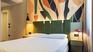 Egyptian cotton sheets, premium bedding, down duvets, minibar