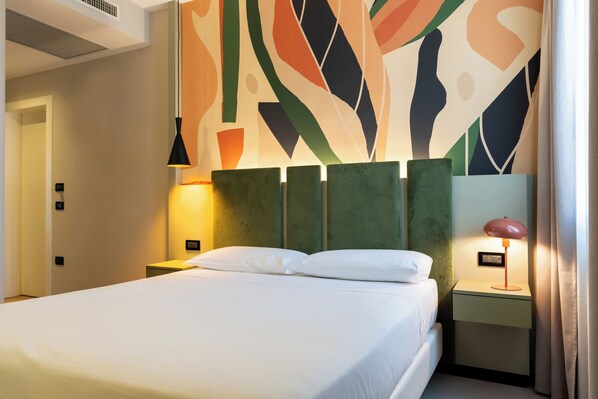 Egyptian cotton sheets, premium bedding, down duvets, minibar