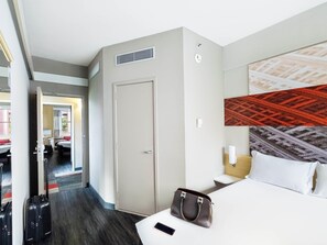 Family Apartment, 2 Double Beds | Minibar, desk, laptop workspace, blackout drapes