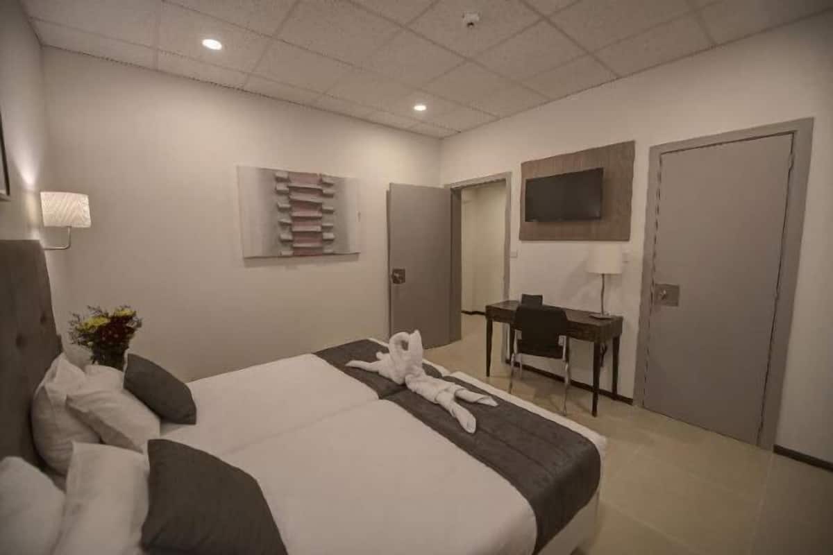 Desk, blackout drapes, iron/ironing board, free WiFi