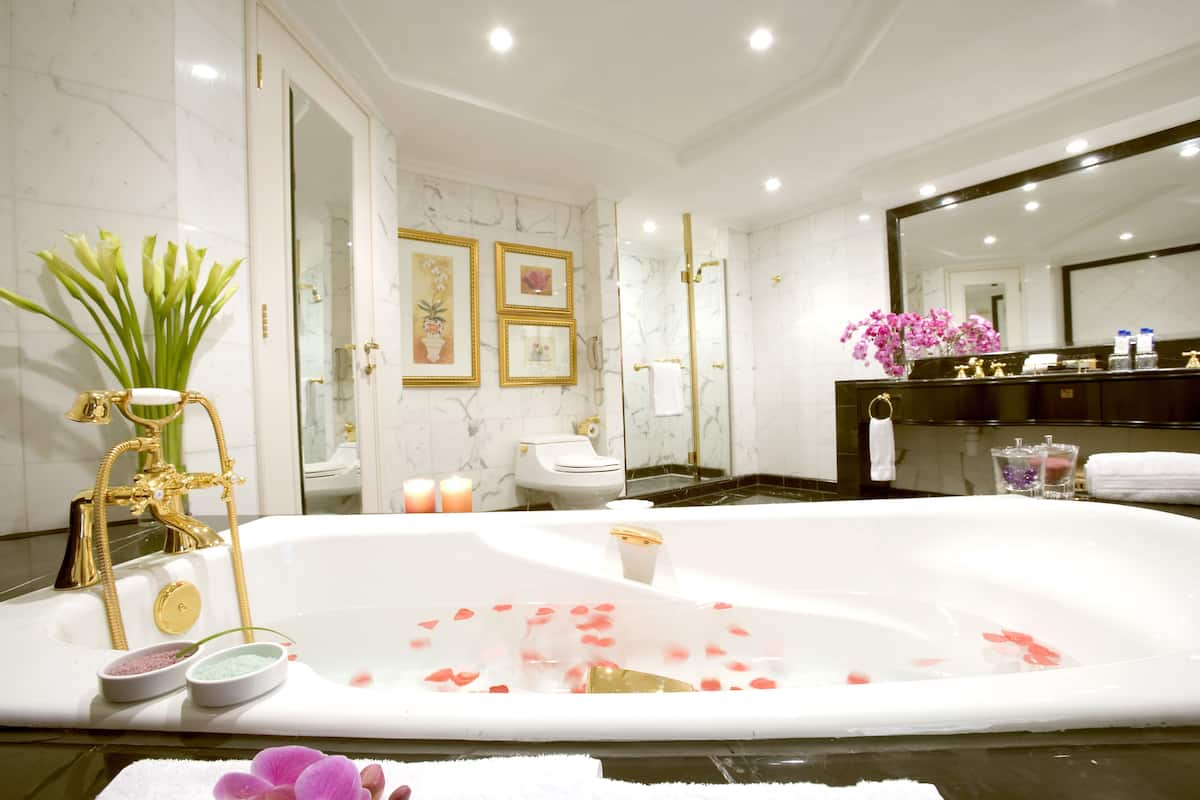 separate bathtub and shower, deep-soaking bathtub, designer toiletries