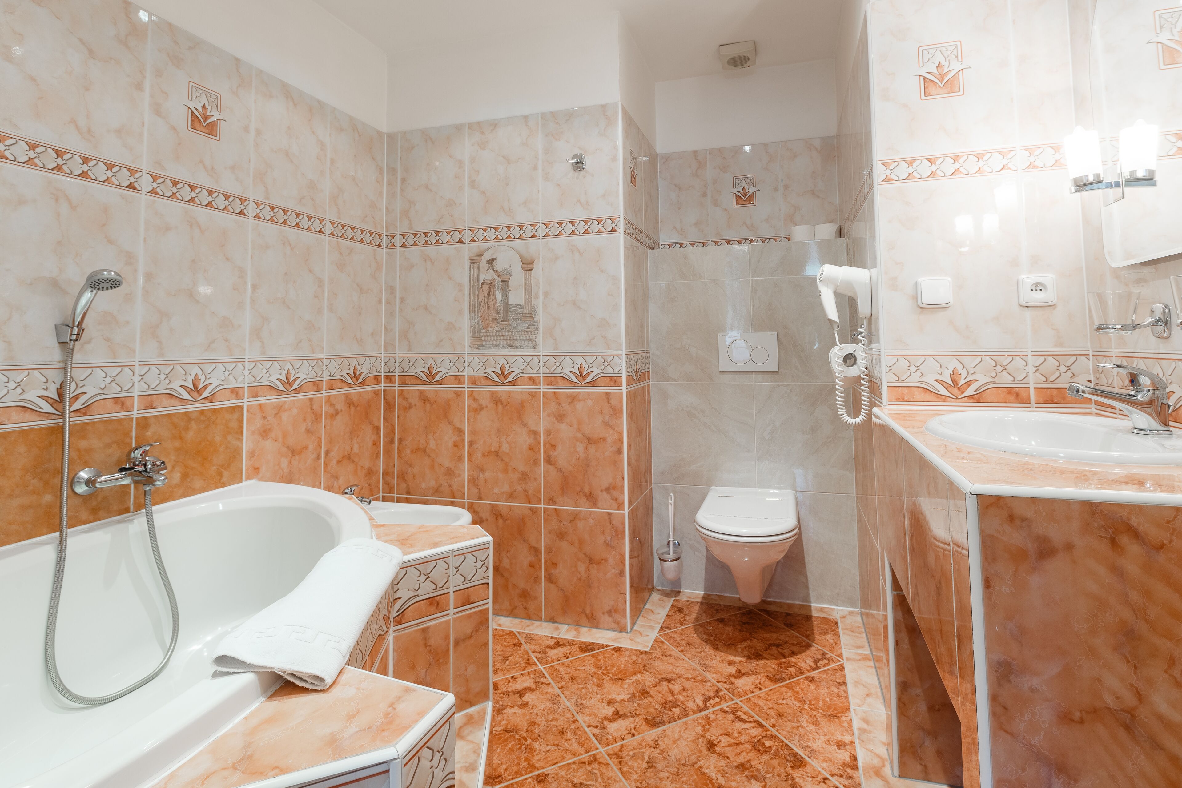 deluxe triple room | bathroom | free toiletries, hair dryer, towels, soap