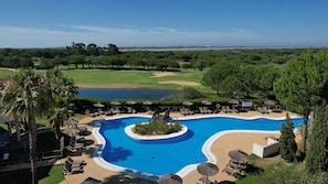 Seasonal outdoor pool, pool umbrellas, sun loungers