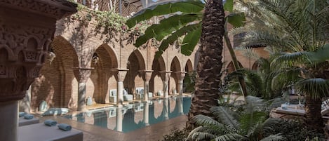 Indoor pool, outdoor pool, pool umbrellas, sun loungers