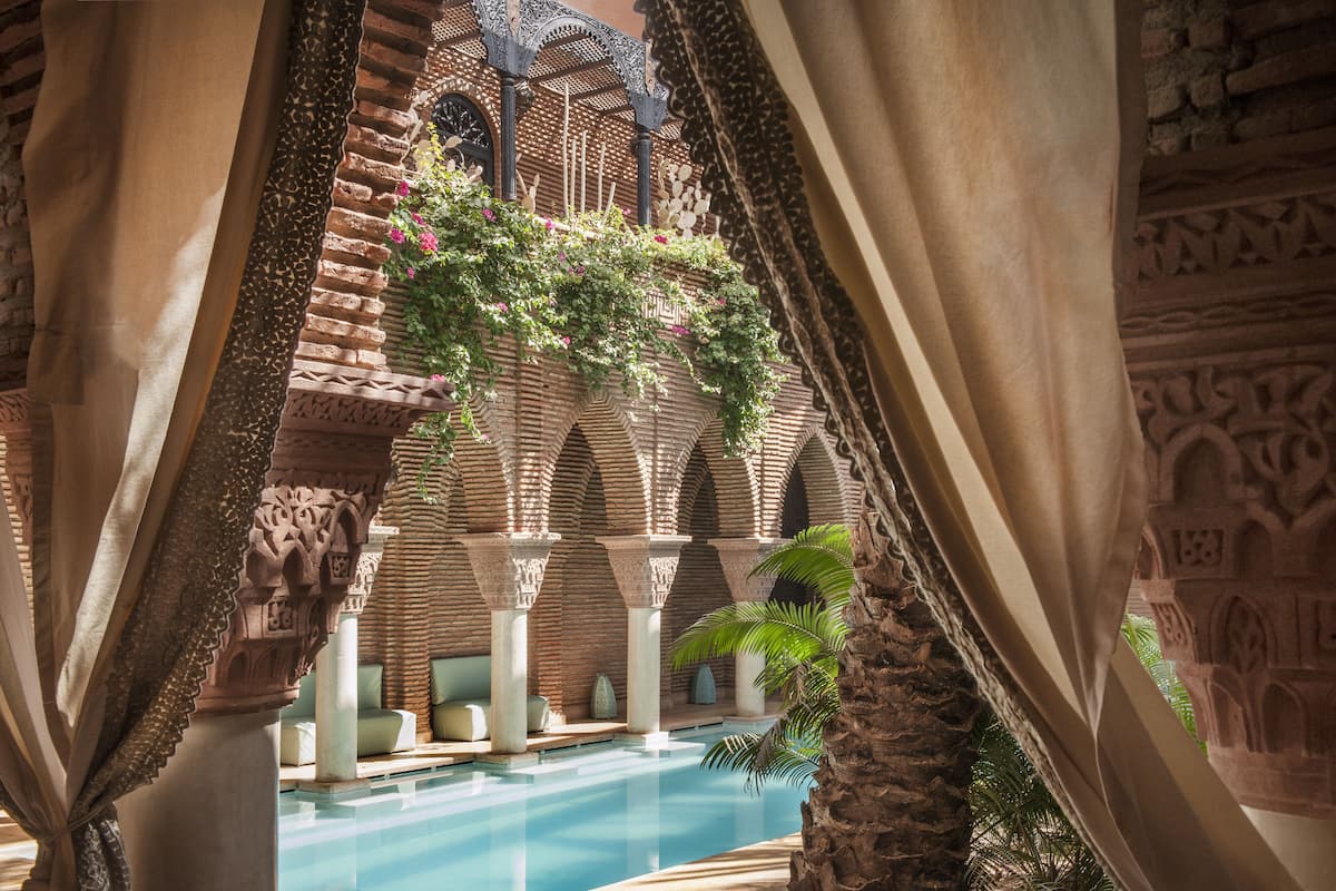 indoor pool, outdoor pool, pool umbrellas, pool loungers