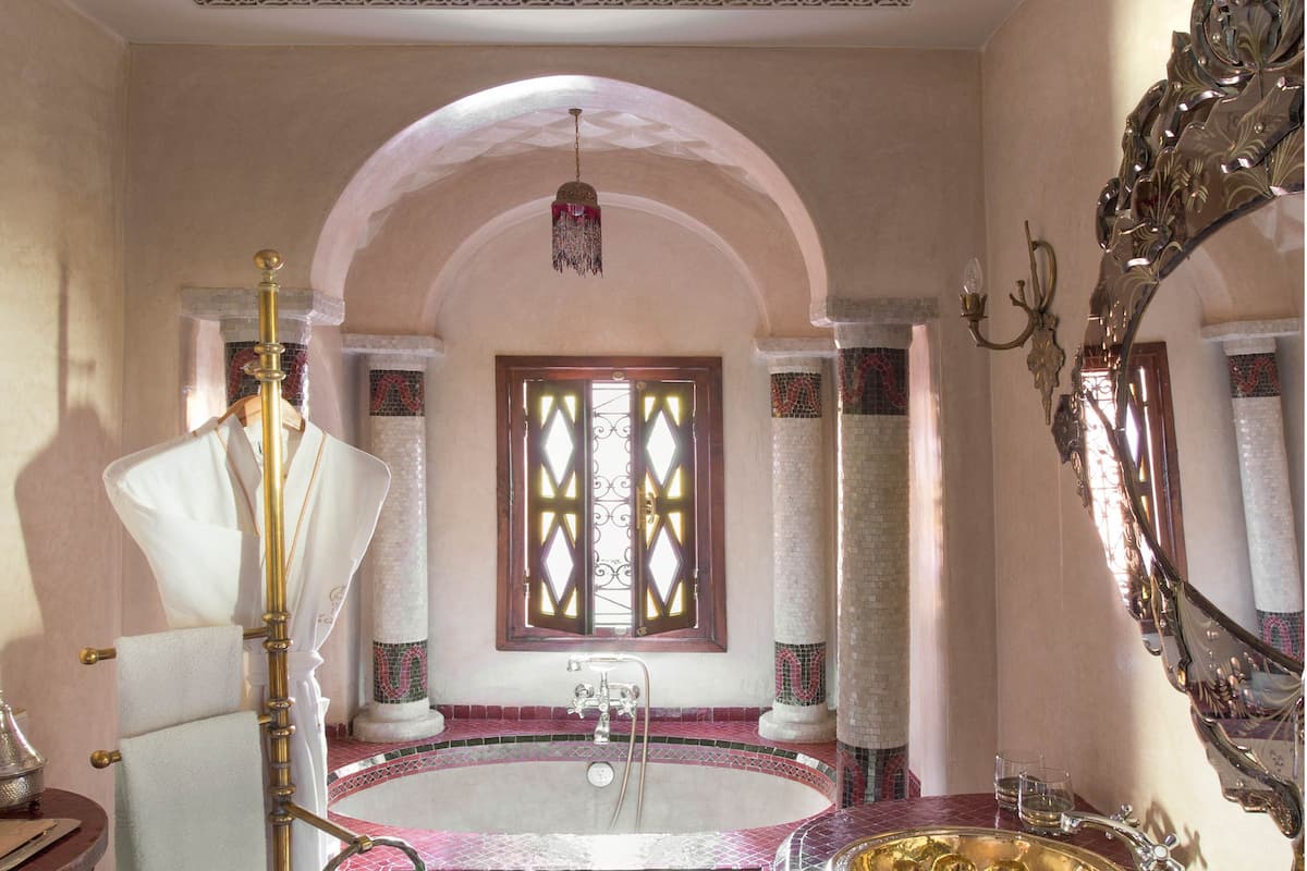 riad room | bathroom | separate bathtub and shower, rainfall showerhead, free toiletries