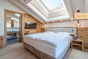 Habitació doble Deluxe | Roba de llit d'alta qualitat i cobrellits 