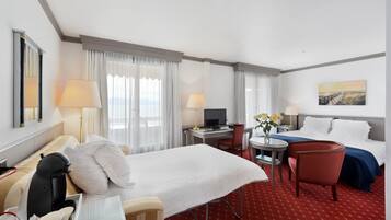 Family Room, Lake View | Free minibar, in-room safe, desk, iron/ironing board