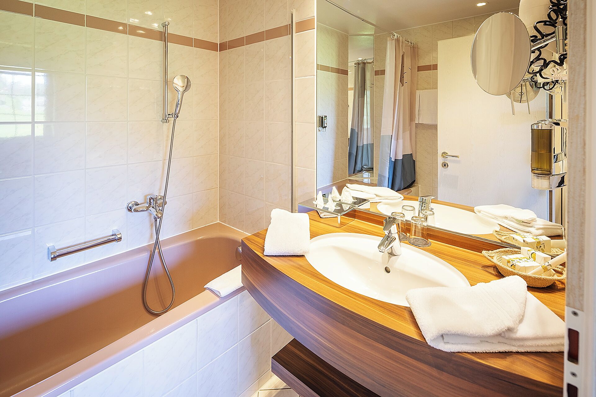 junior suite, balcony, mountain view | bathroom | combined shower/bathtub, deep-soaking bathtub, free toiletries