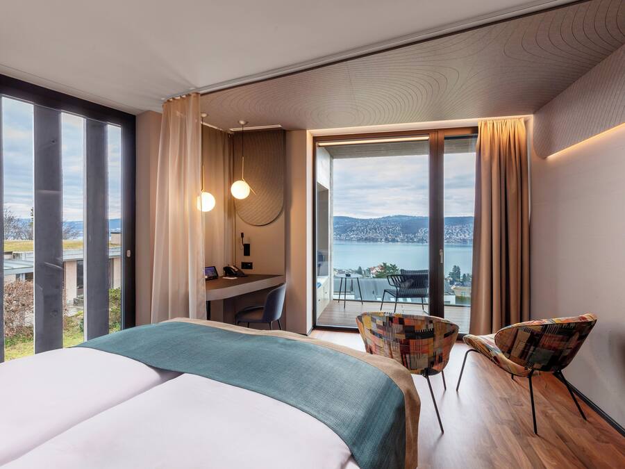 Premium bedding, free minibar items, in-room safe, desk